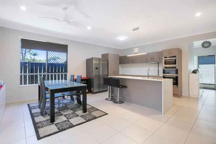 Centrally located, modern and backing onto leafy reserve