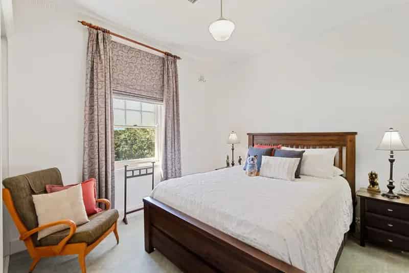 Buy heritage home in town with period features and private yard