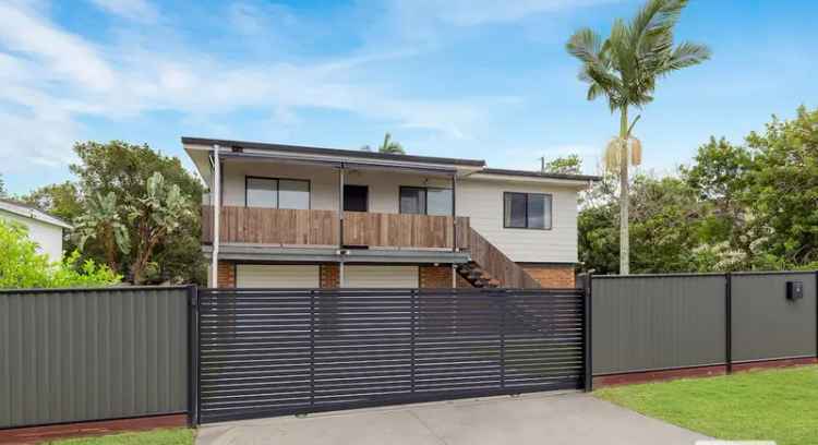 Buy House in Loganholme with Modern Kitchen and Double Shed