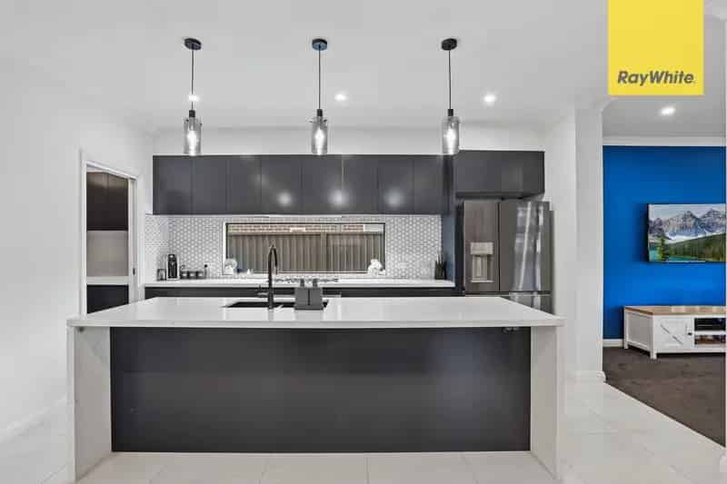 4 Bedroom 2 Bathroom Family Home with Modern Kitchen and Large Backyard