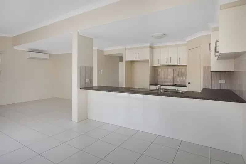 Buy townhouse in Hervey Bay with 4 bedrooms and low body corporate fees