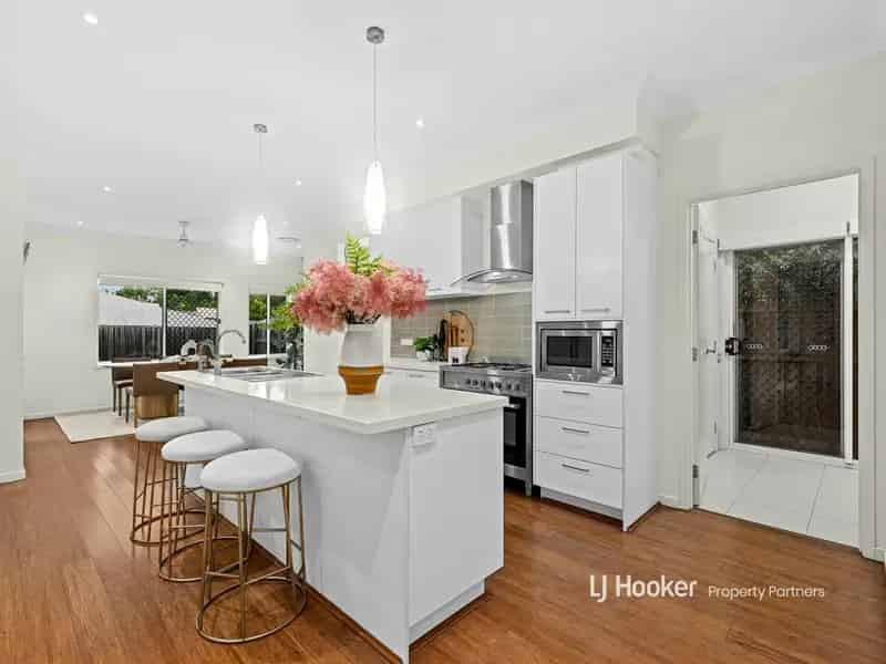 Buy stylish family home in Rochedale with multiple living areas