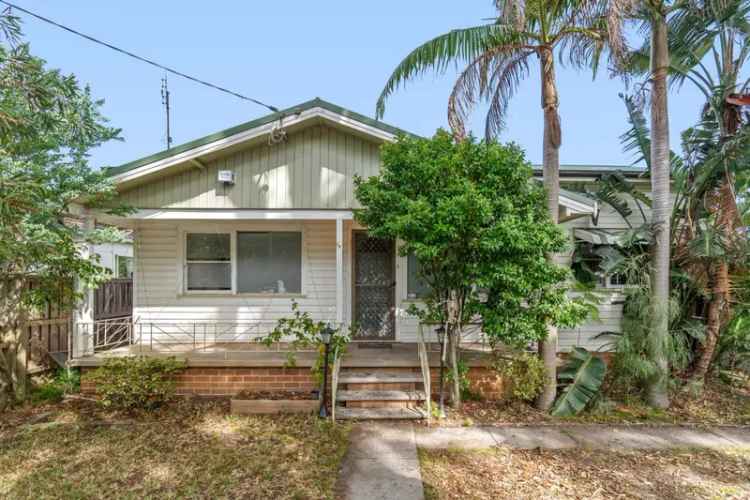 Investment opportunity buy house with dual residences in Woy Woy