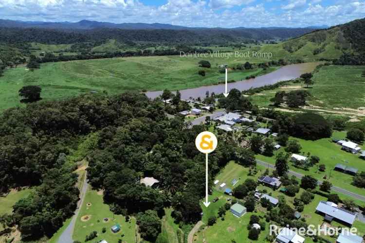 Buy land in Daintree Village with rainforest and creek views