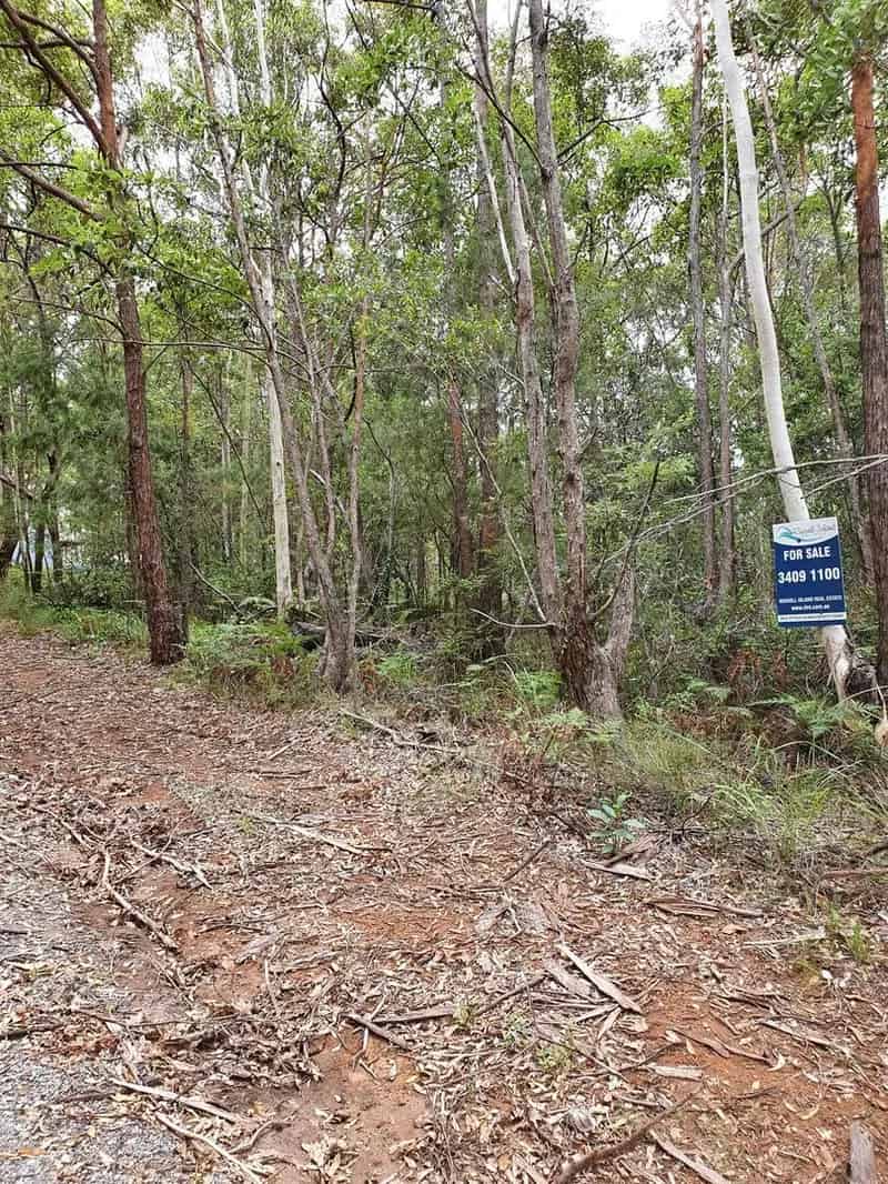 buy land bush block on Russell Island with power and water access