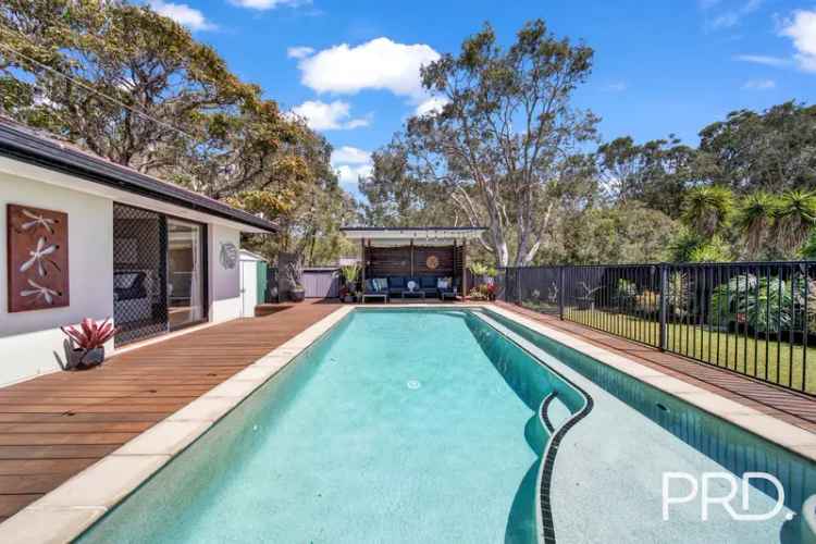 RENOVATED FAMILY HOME WITH STUNNING LAP POOL & DRIVE THROUGH GARAGE TO BACKYARD!