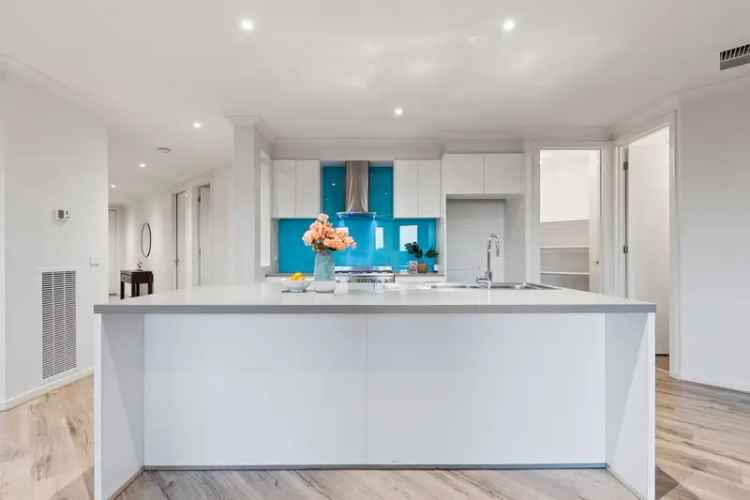 Buy house in Cardinia Lakes featuring four bedrooms and lake views