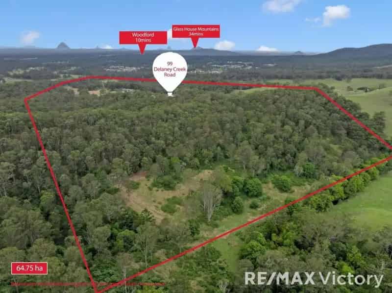 Buy rural property in Glasshouse Mountains with multiple outbuildings