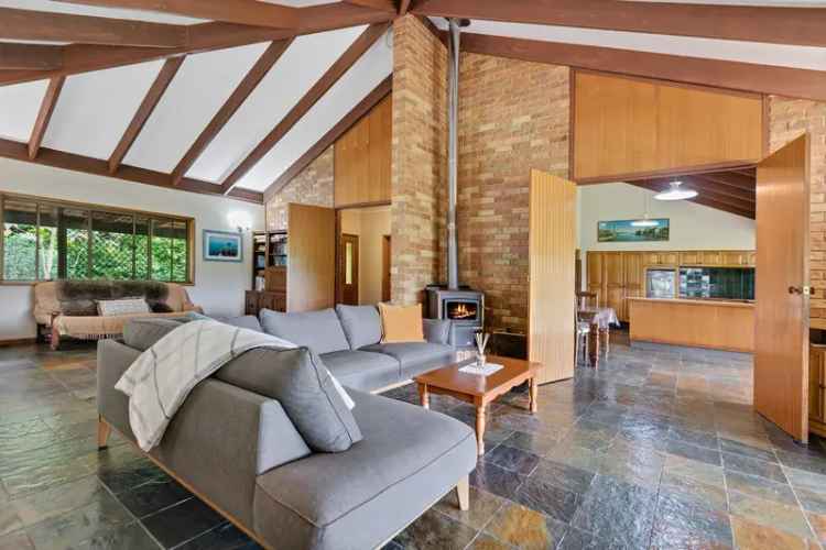 House for Sale in West Woombye with Panoramic Views and Sustainability Features