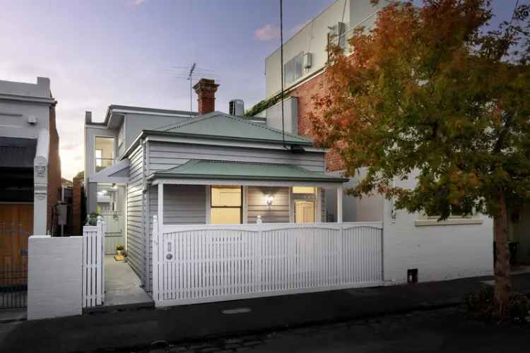 Buy Classic Victorian House in Fitzroy North Village with Modern Features