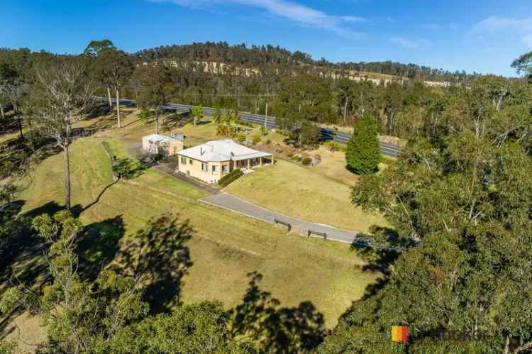 3.1-Hectare Family Home with 4-Car Shed Near Batemans Bay