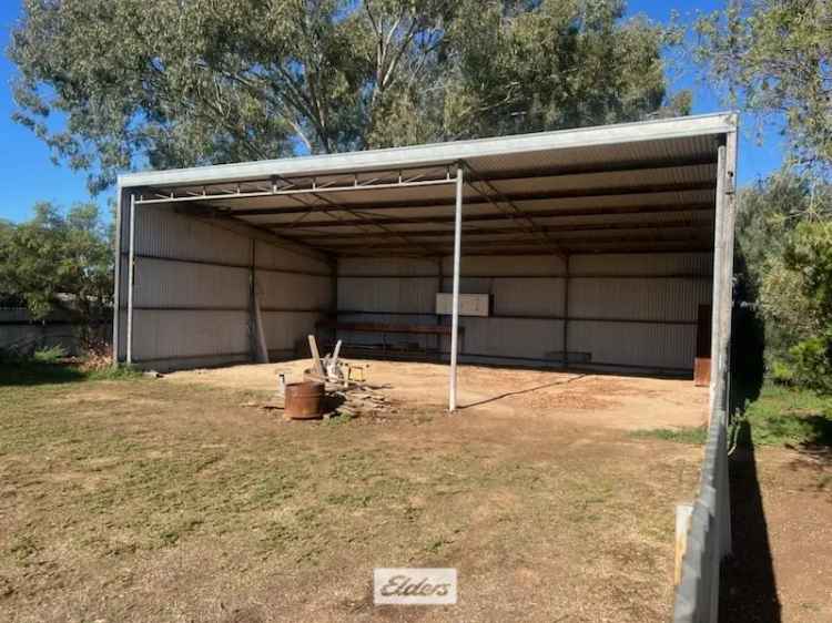 Buy cottage in Ouyen township with ample shedding and room to improve