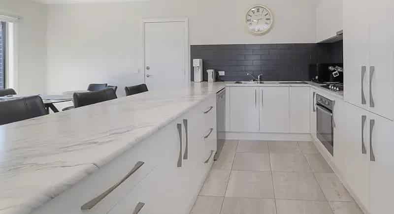 Buy Townhouse in Hamilton with Modern Elegance and No Body Corp