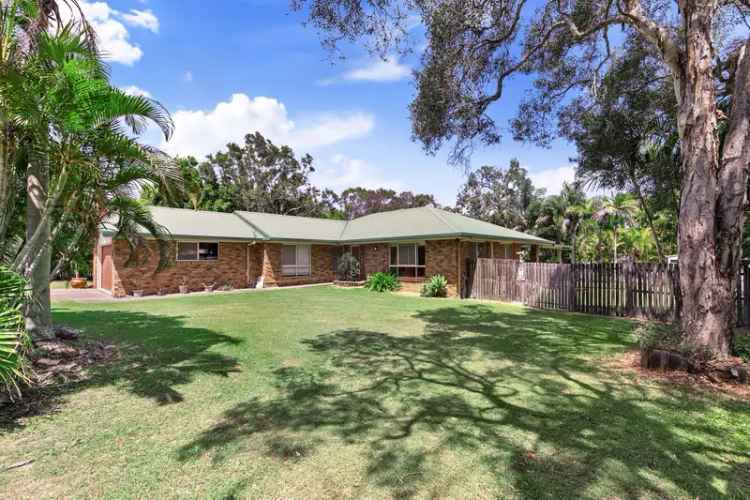 Ideal Family Oasis on a Picturesque Acre