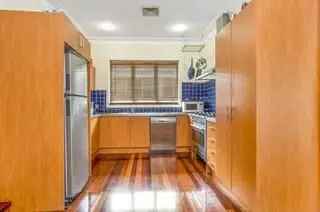 Rent home in Chermside with renovated kitchen and air conditioning