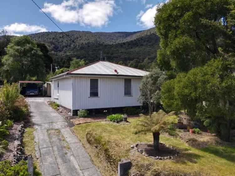 Charming Two-Bedroom Home with Enchanting Gardens - Move-in Ready!