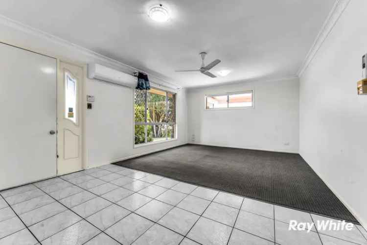 Buy House in Raceview with Spacious Yard and Modern Amenities