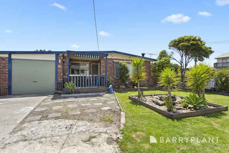 Charming Beachside Brick Home with Endless Potential