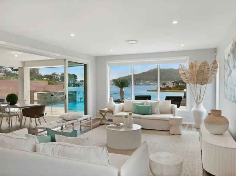 Luxury buy waterfront home in Brisbane Water with stunning views and features