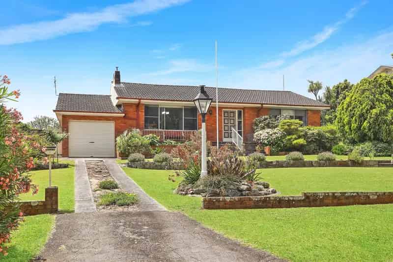 Buy single level brick home with water views in a serene location