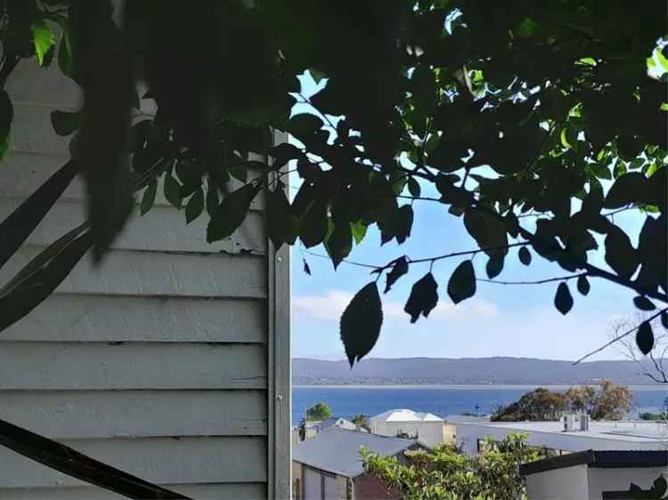 Charming 3 Bed Cottage with Ocean Views Subdivisible Block