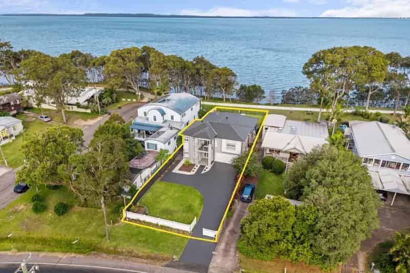 Immaculate Flood Free Waterfront Masterpiece.