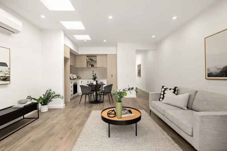 Buy contemporary two bedroom terrace home close to Wheelahan Gardens