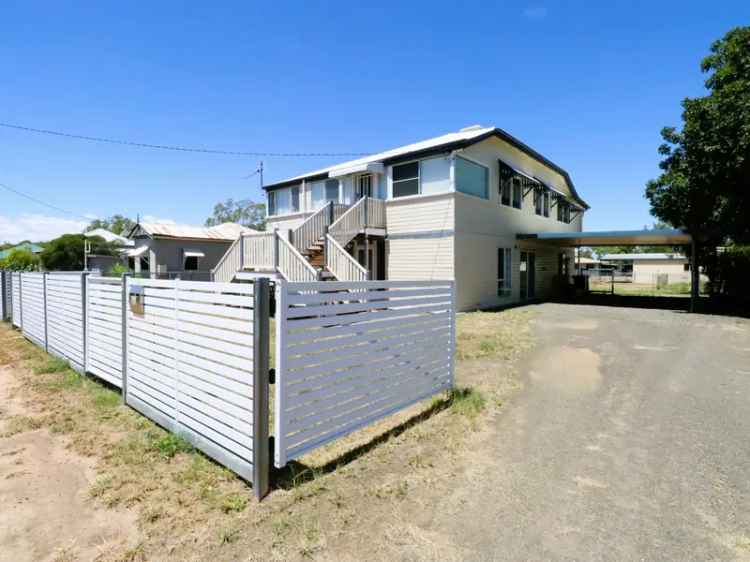 Buy Queenslander Home with Dual Living in Quiet Street