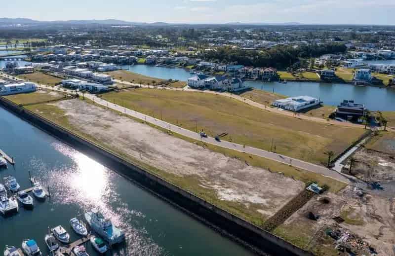 Buy land in Sanctuary Cove with stunning views and exclusive features