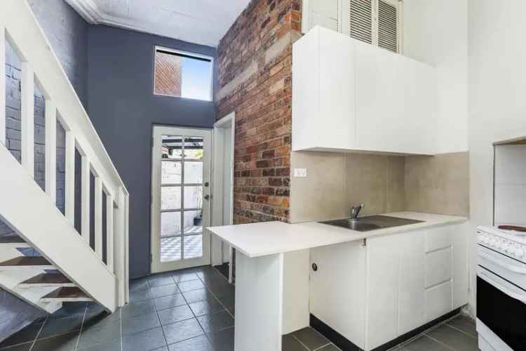 Buy house in Surry Hills with charming features and private courtyard