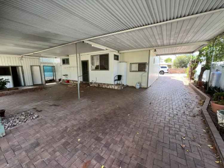 Two Bedroom Home with Spacious Yard and Double Carport