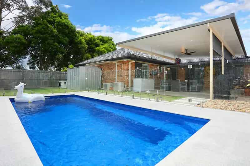 Buy House in Coombabah Perfect Family Home With Pool and Modern Features