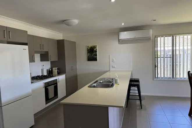 Spacious 4-Bedroom Brick Home in Hervey Bay