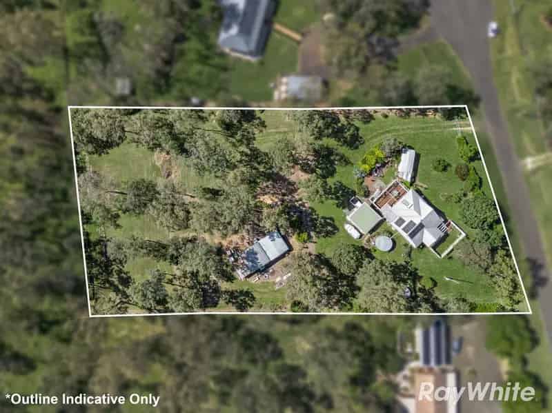 UNIQUE COUNTRY RETREAT ON 1.5 ACRES WITH SHEDS, WORKSHOP & SCENIC VIEWS
