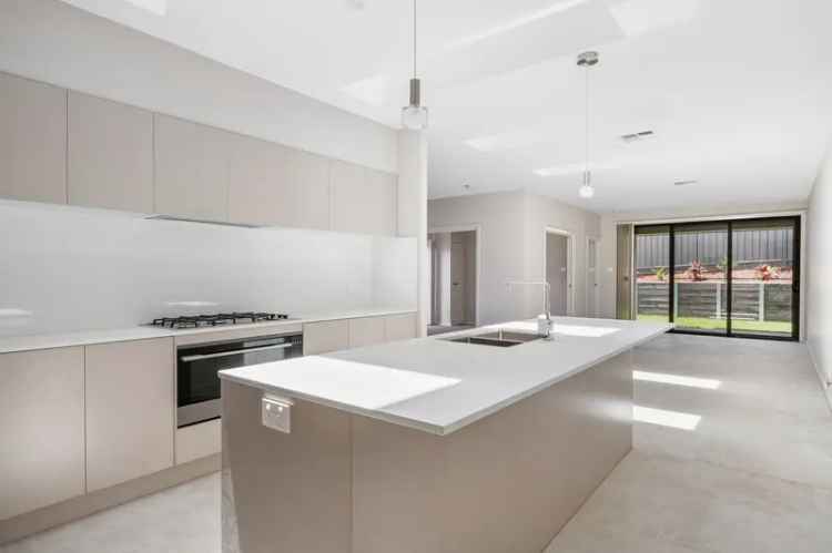 Buy townhouse in Bolwarra Heights with stylish features and modern design