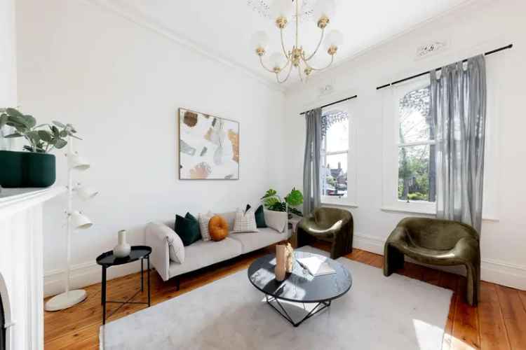 Buy Victorian house in Carlton North with period charm and spacious living