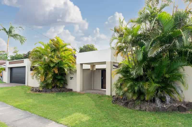 Buy Family Home in Benowa with Pool and Theatre Room