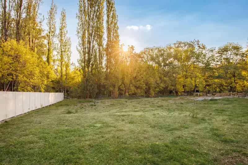 Buy Land in Green Space with Potential for Family Home or Investment