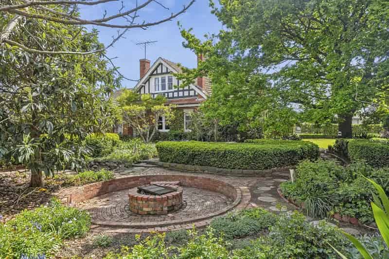 Tudor Elegance with Botanical Grandeur - A Timeless Estate Across Two Titles