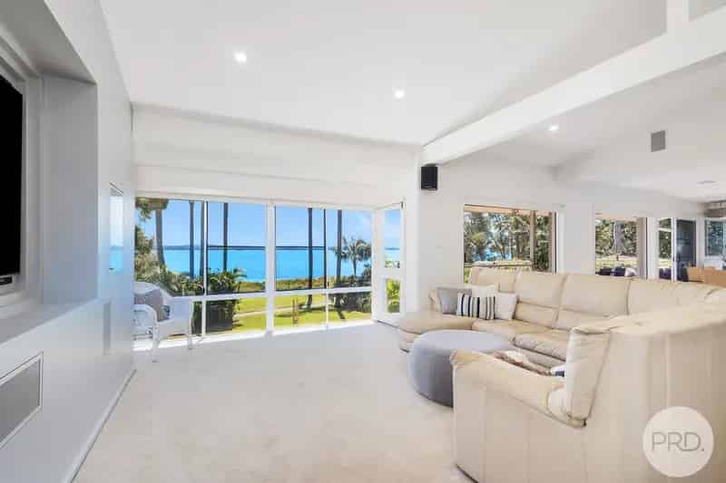 PINNACLE OF WATERFRONT LUXURY IN CORLETTE!