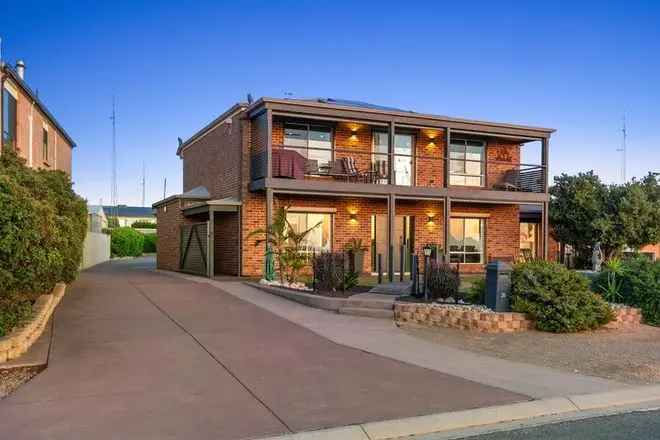 Luxury Waterfront Retreat with Breathtaking Views and Beach Access