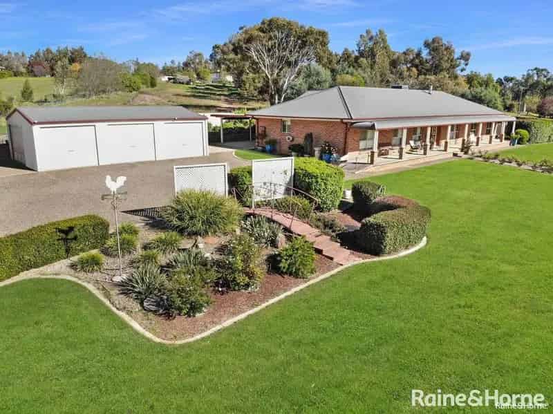Buy modern 4 bedroom home in well presented style with garden features
