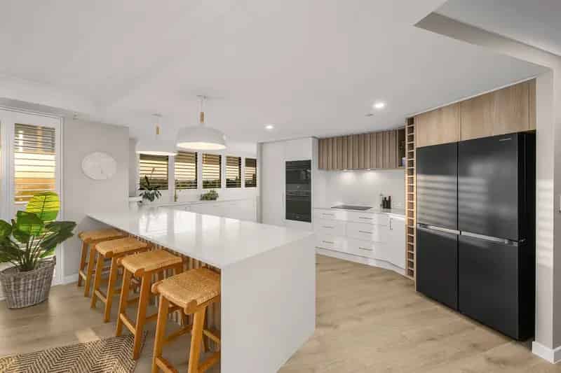 MOTIVATED SELLER - ELEVATED COASTAL LIVING AWAITS!