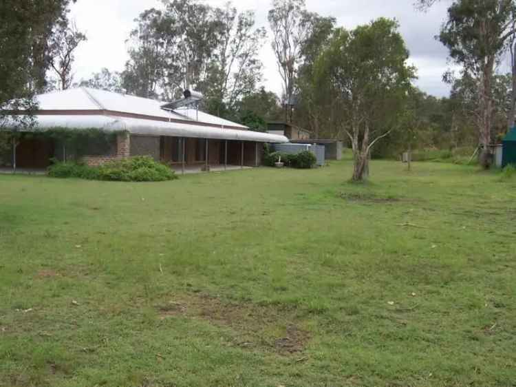 Buy House in Jimboomba with 6.38Ha Sub-Divisible Block and Endless Possibilities