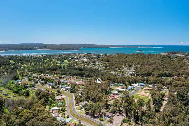 Buy land in Catalina with treetop views and town services