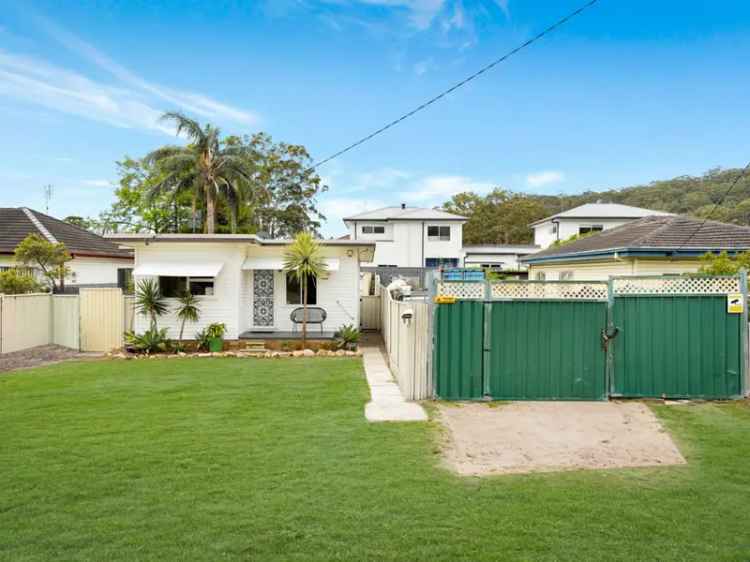 Entry level partially renovated cottage moments to Ettalong Beach