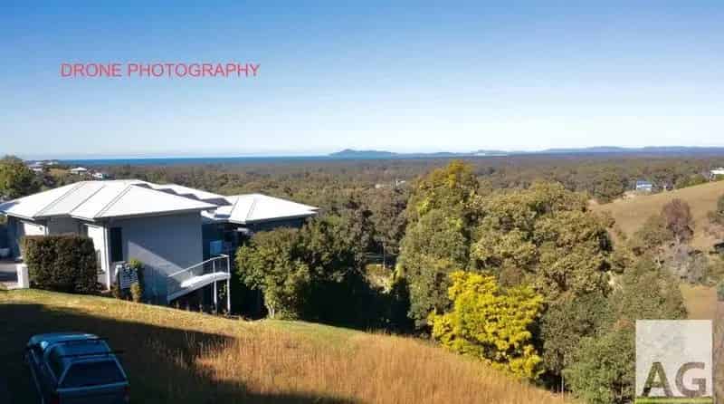 Buy Land in Tallwoods Village with Leafy Outlook over Golf Course