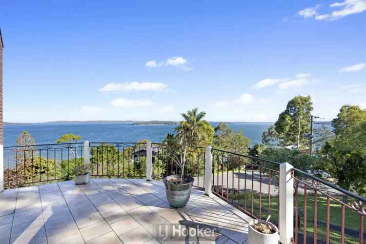 Buy house in Lake Macquarie with stunning views and versatile layout