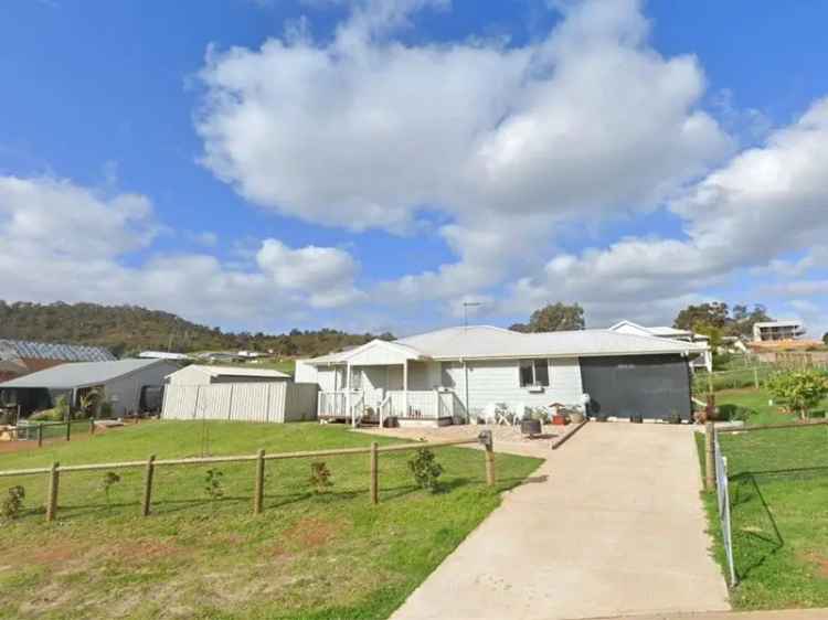 4-Bedroom Family Home with Huge Backyard and Orchard