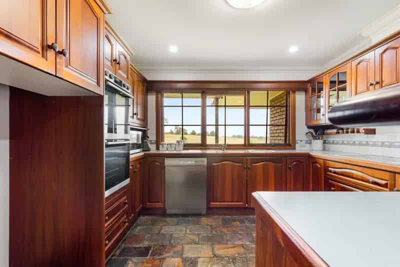 Stunning, solid-built colonial-style lifestyle property featuring multiple workshops and entertaining areas